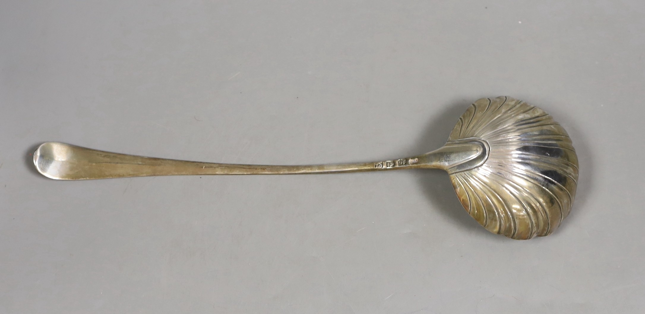 A George III silver Old English beaded pattern soup ladle, William Turton?, London, 1771, 33cm, with shell bowl, 127 grams.